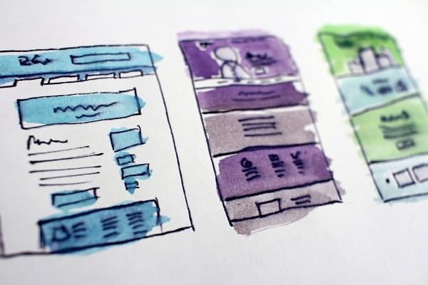 A colourful hand-drawn sketch planning how to to make a website